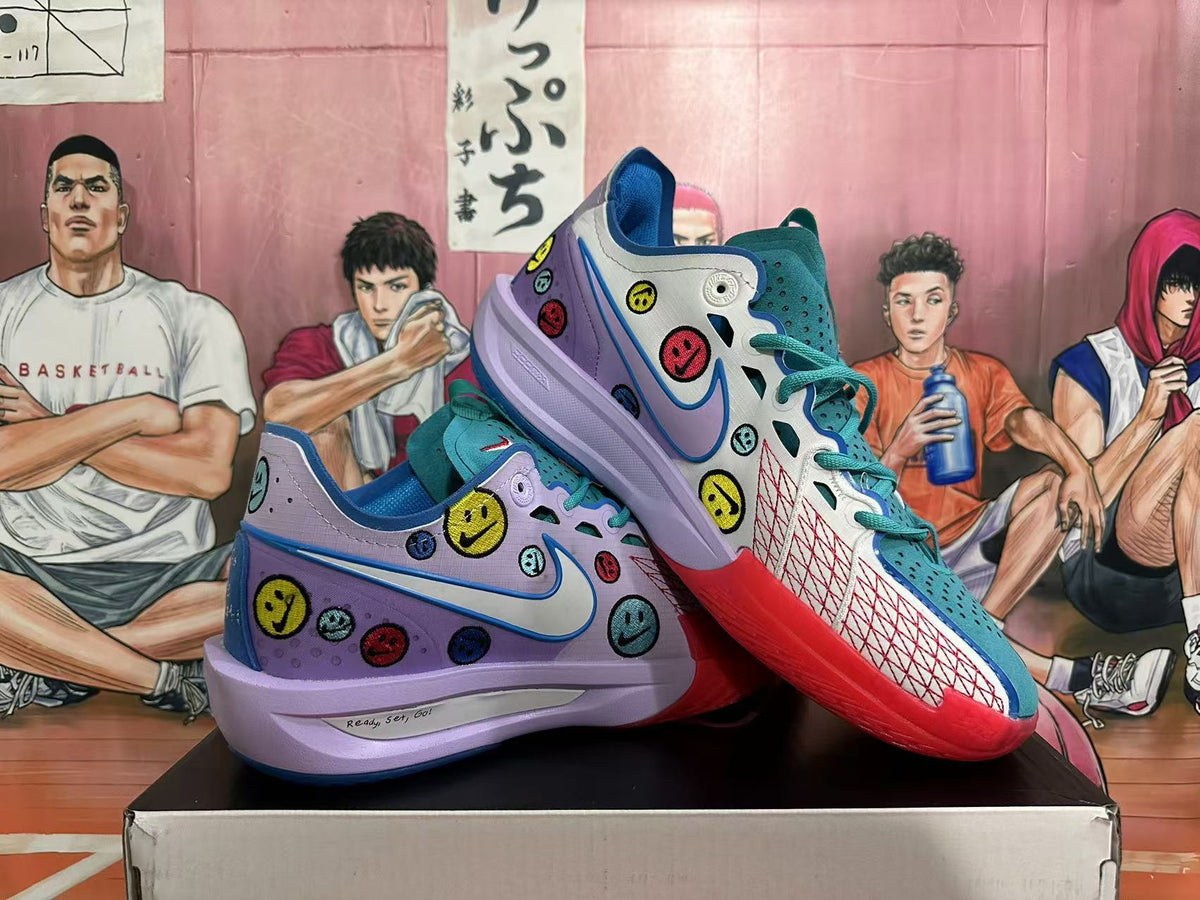 Nike Crooked-Smile Face Basketball Sneakers in Purple and Teal - product image from the listing.
