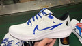 Nike Air Zoom Pegasus 40 Running Shoes in White Blue FJ2843-100 - product image from the listing.