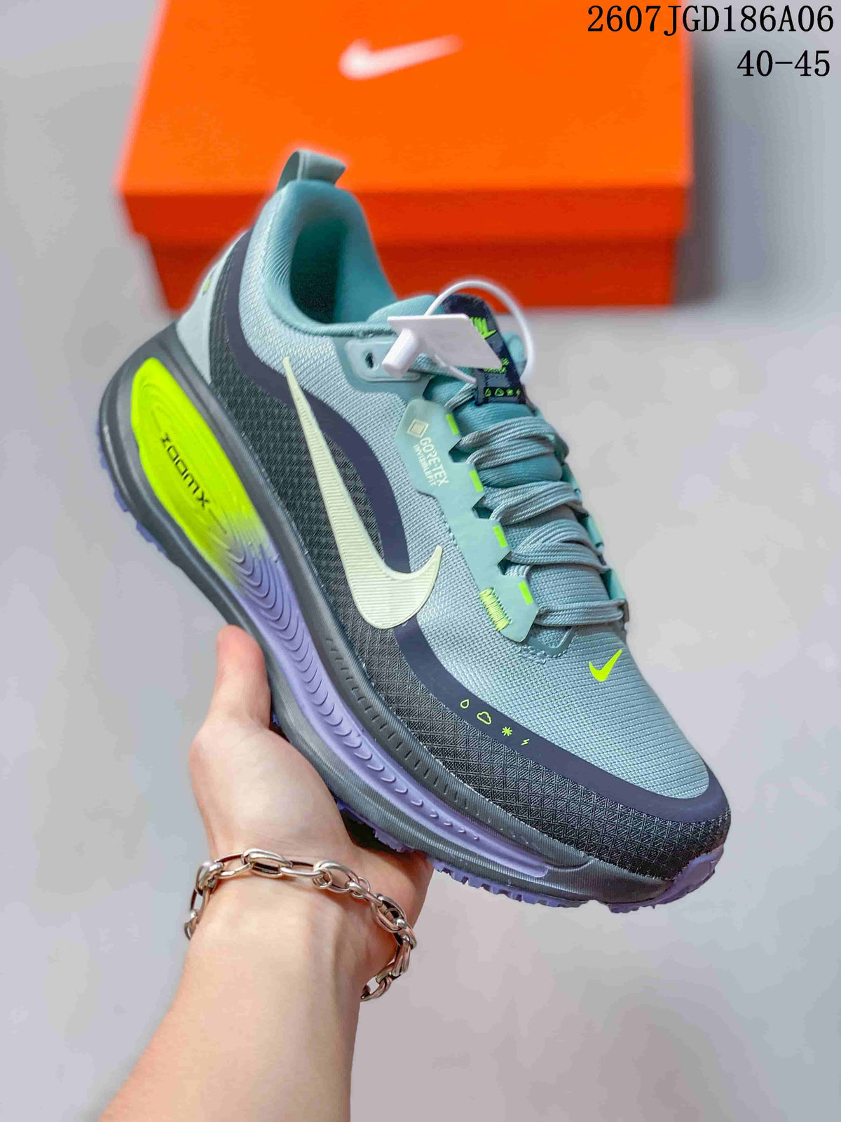 Nike Vomero Plus Run Running Sneakers in Gray - product image from the listing.