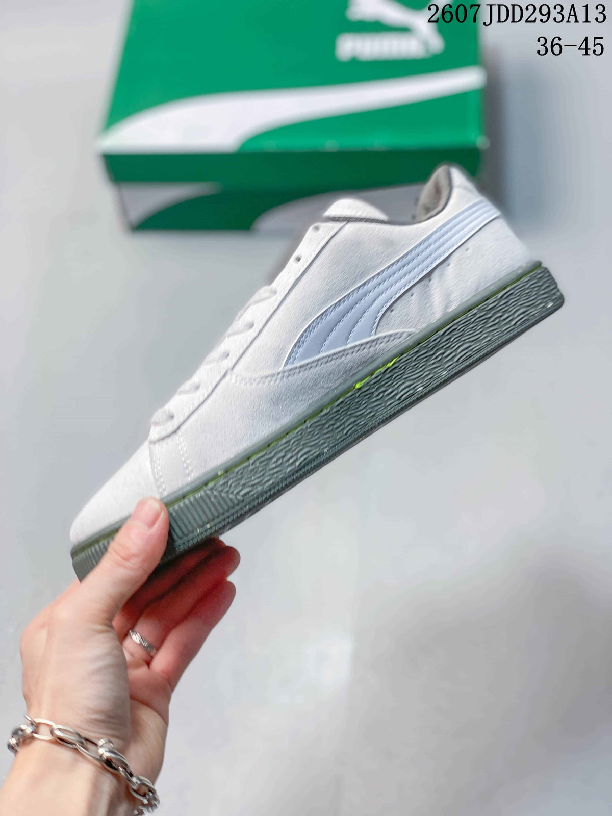 PUMA BMW MMS Suede XL Sneakers in White and Gray 2607JDD293A13 - product image from the listing.
