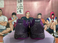 Nike Purple Basketball Footwear with Blue Swoosh - product image from the listing.