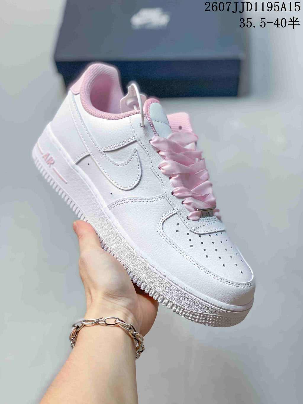 Nike Air Force 1 '07 Low Sneakers in White Pink HV4403 - product image from the listing.
