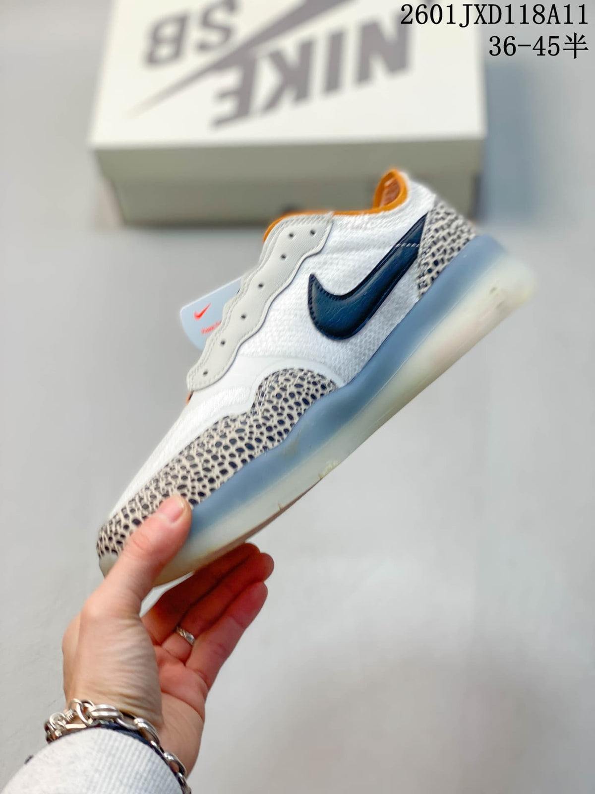 Nike SB PS8 Sneakers in White Blue Orange FV8493-200 - product image from the listing.