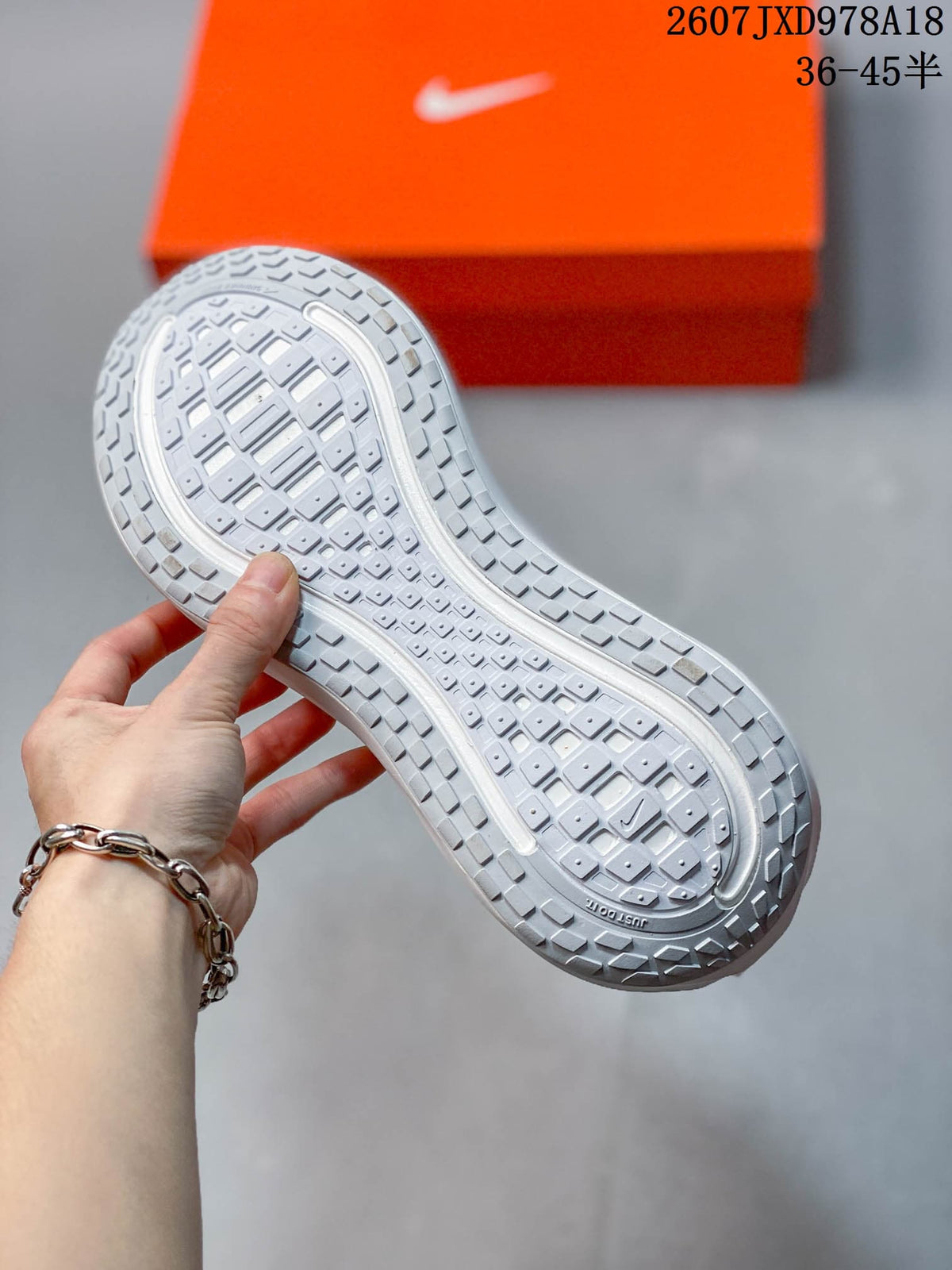 Nike Vomero Plus Running Shoes in White JXD978A18 - product image from the listing.