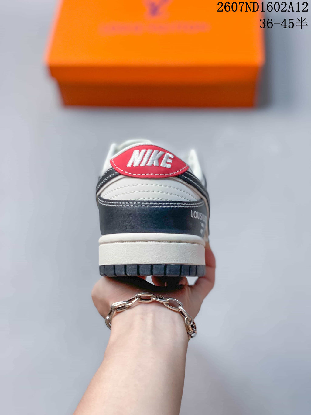 Nike SB Dunk Low Sneakers in Black White Red - product image from the listing.