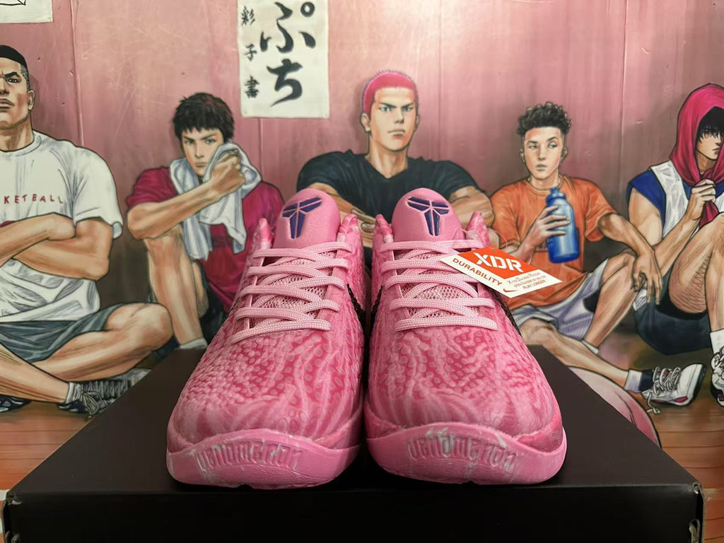 Nike Pink Basketball Trainers with Black Swoosh - product image from the listing.