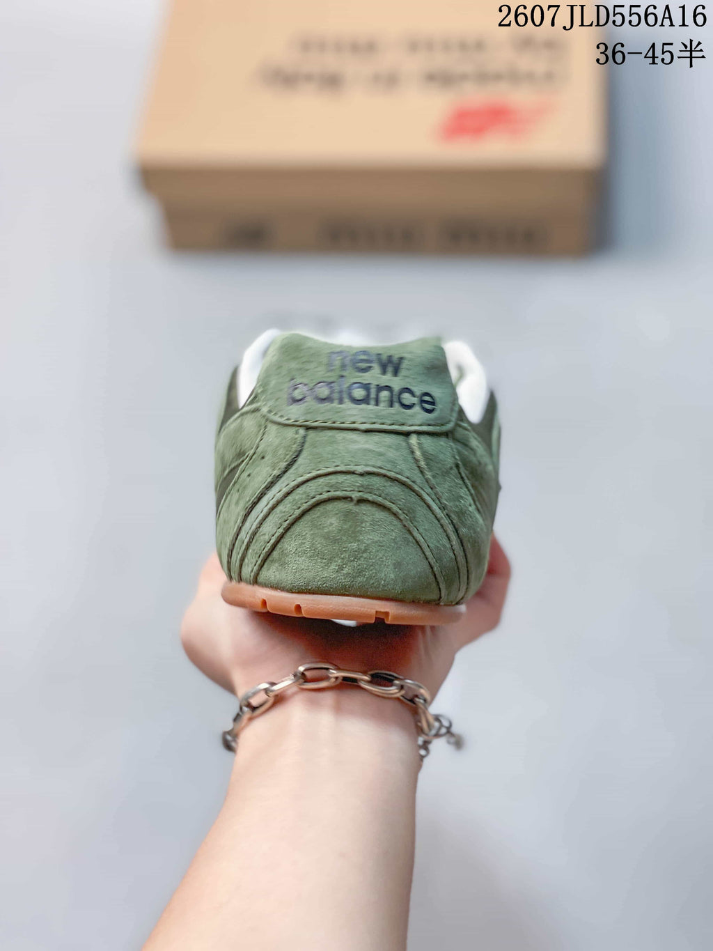 Miu Miu x New Balance 530 SL Sneakers in Green 2607JLD556A16 - product image from the listing.