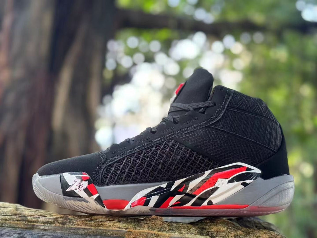 Jordan XXXVIII Playoffs 23 Basketball Shoes in Black Red - product image from the listing.