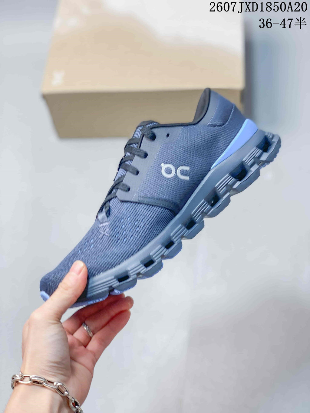 On Cloud X 4 Low-Cut Sneakers Dark Gray Blue 2607 JXD1850A20 - product image from the listing.