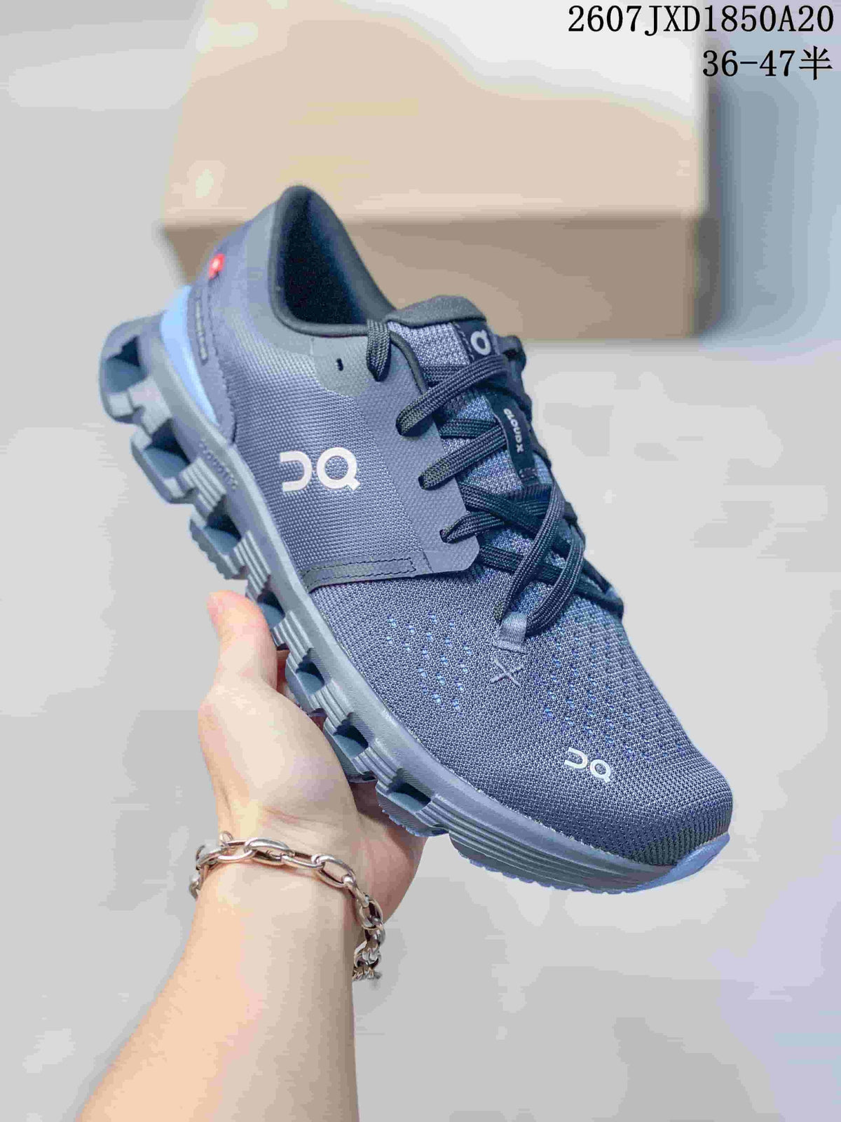 On Cloud X 4 Low-Cut Sneakers Dark Gray Blue 2607 JXD1850A20 - product image from the listing.