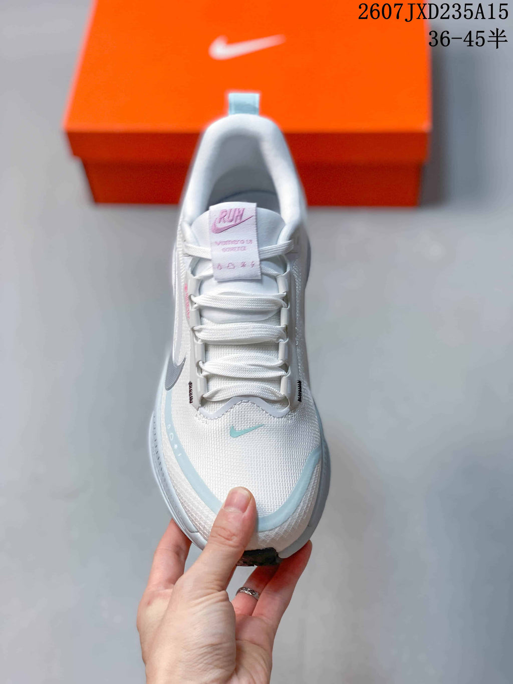 Nike Air Zoom Vomero 18 GTX Running Shoes in White Light Blue - product image from the listing.