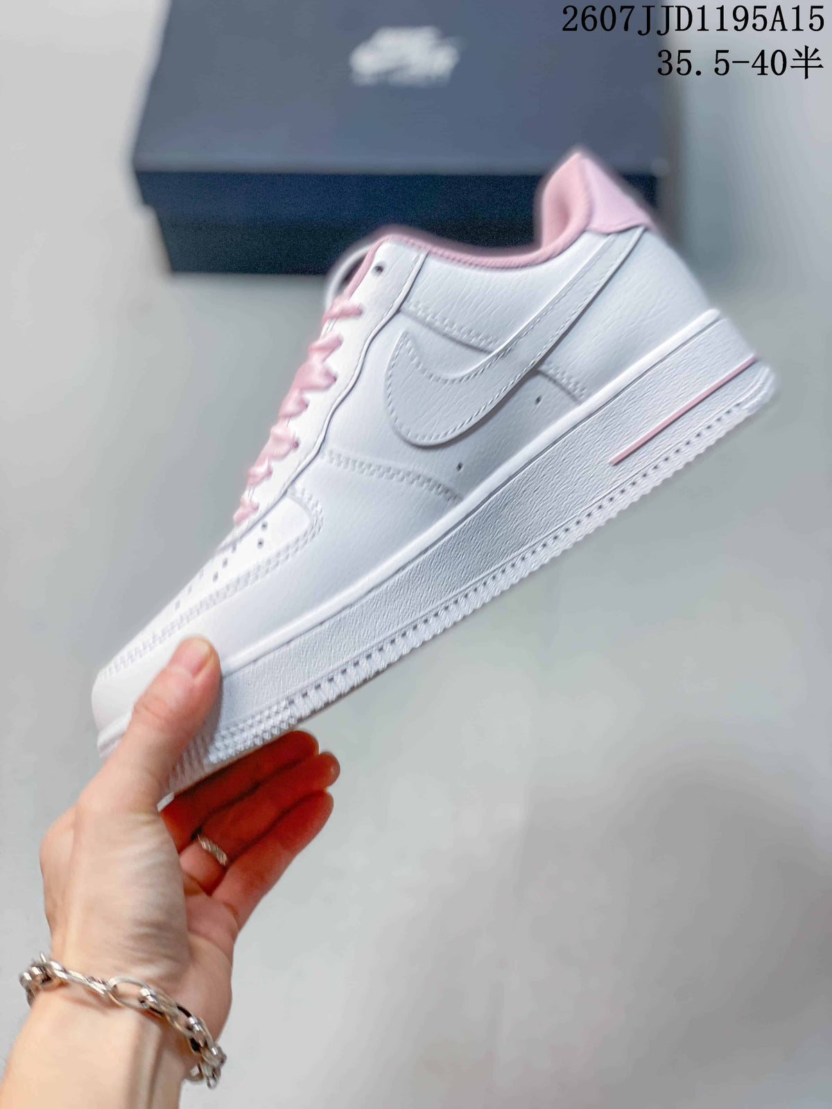 Nike Air Force 1 '07 Low Sneakers in White Pink HV4403 - product image from the listing.