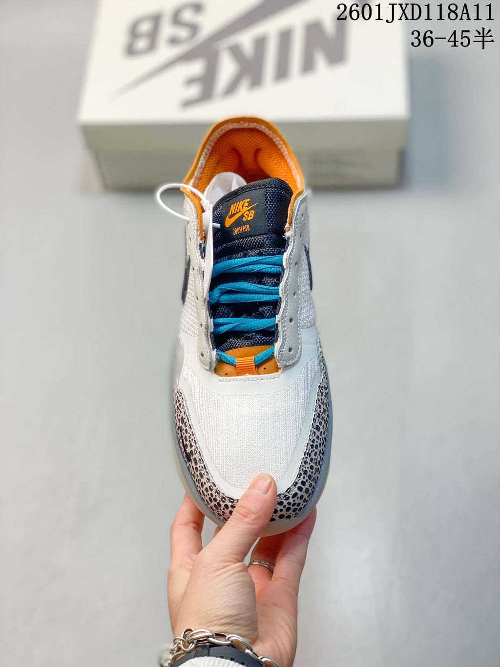 Nike SB PS8 Sneakers in White Blue Orange FV8493-200 - product image from the listing.