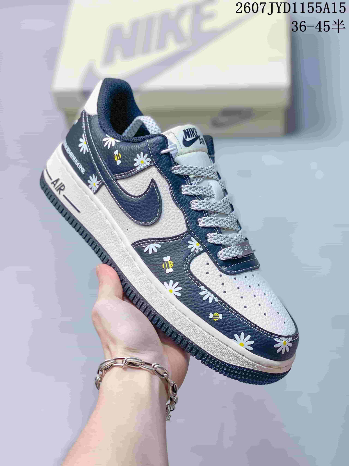Nike Air Force 1 Low Sneakers Navy Floral in White 2607JYD1155A15 - product image from the listing.