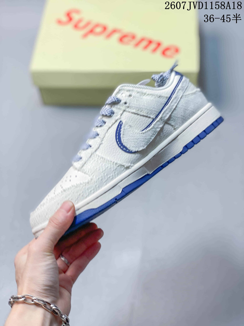 Nike SB Dunk Low Gray White Blue Skate Trainers 2607JVD1158A18 - product image from the listing.