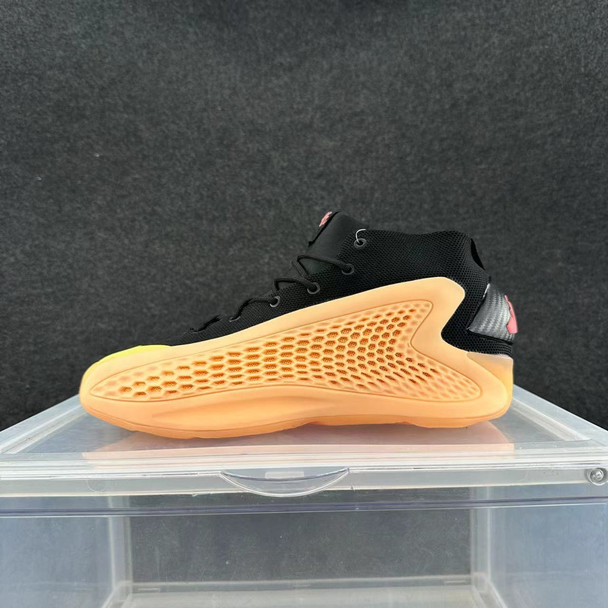 High-Top Sneakers in Black and Orange - product image from the listing.