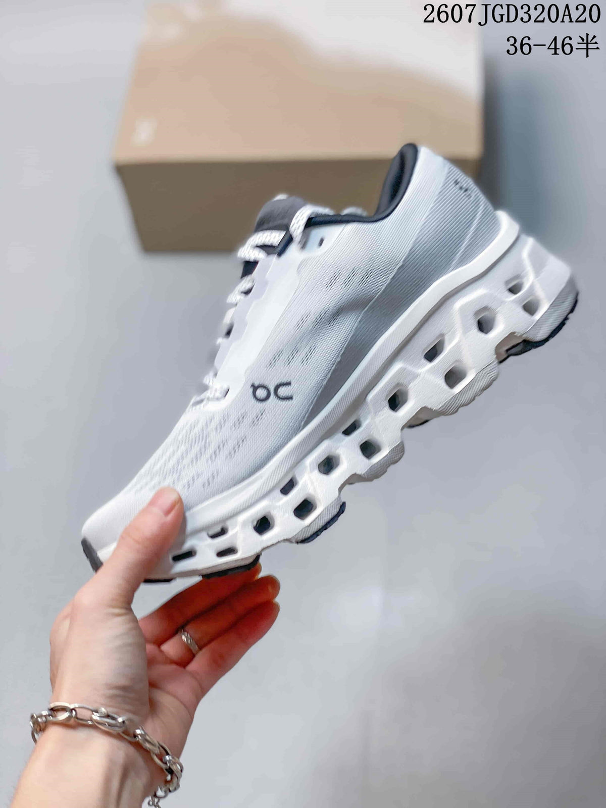 On Cloudmonster 3 Running Sneakers in White Black 2607JGD320A20 - product image from the listing.