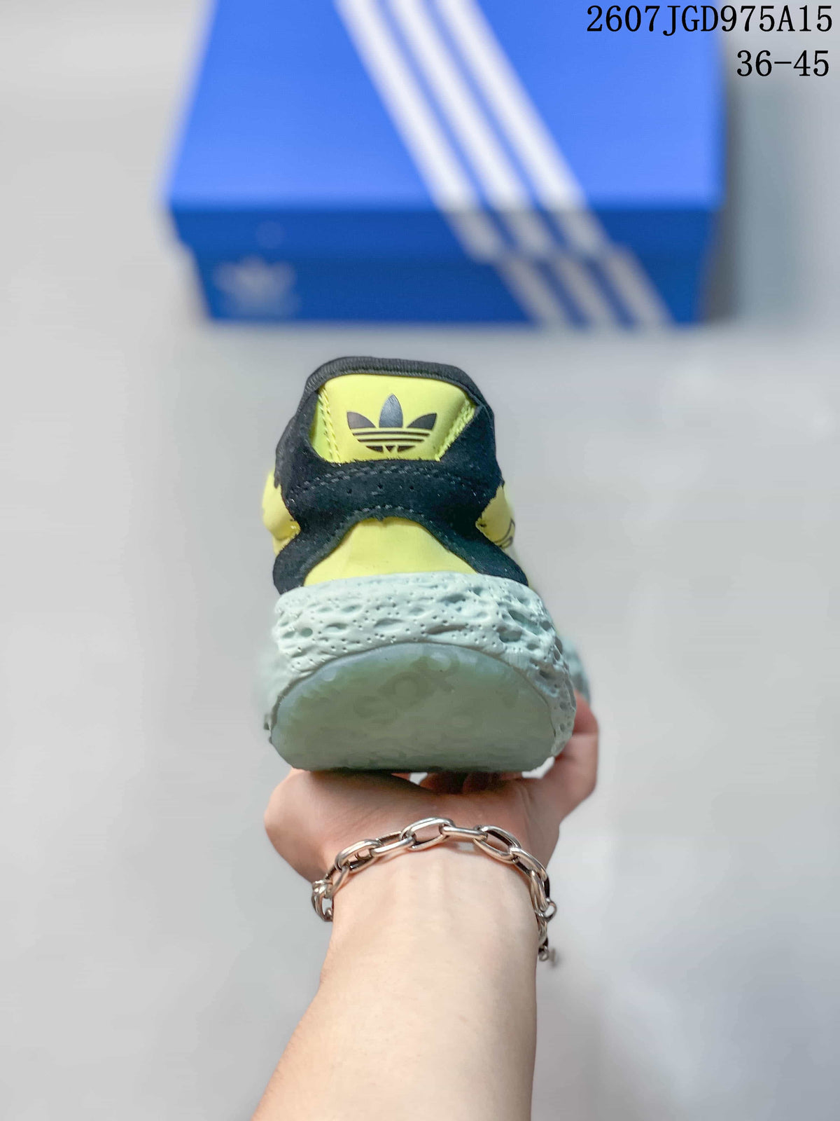 Adidas Zponge Low-Top Sneakers in Yellow Black IH0977 - product image from the listing.