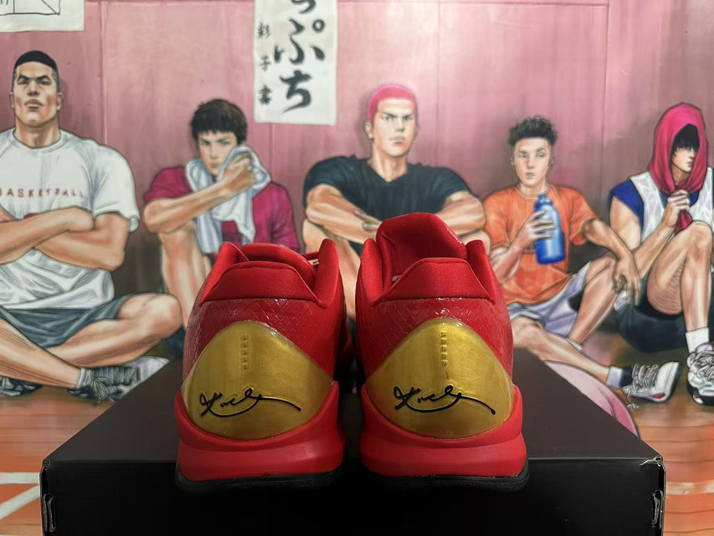 Nike Kobe Basketball Shoes in Red and Gold - product image from the listing.
