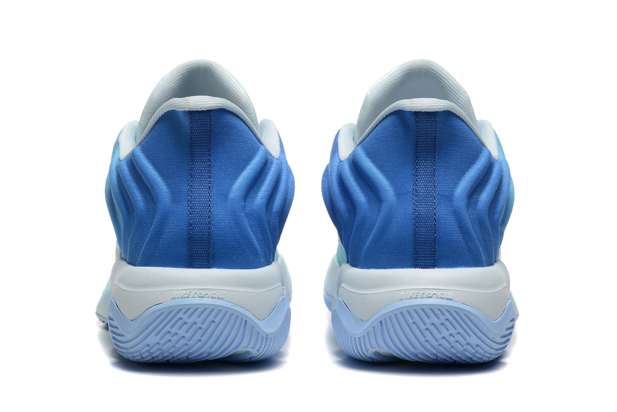 Nike Basketball Footwear in Aqua Blue and White, Style 885-6 - product image from the listing.