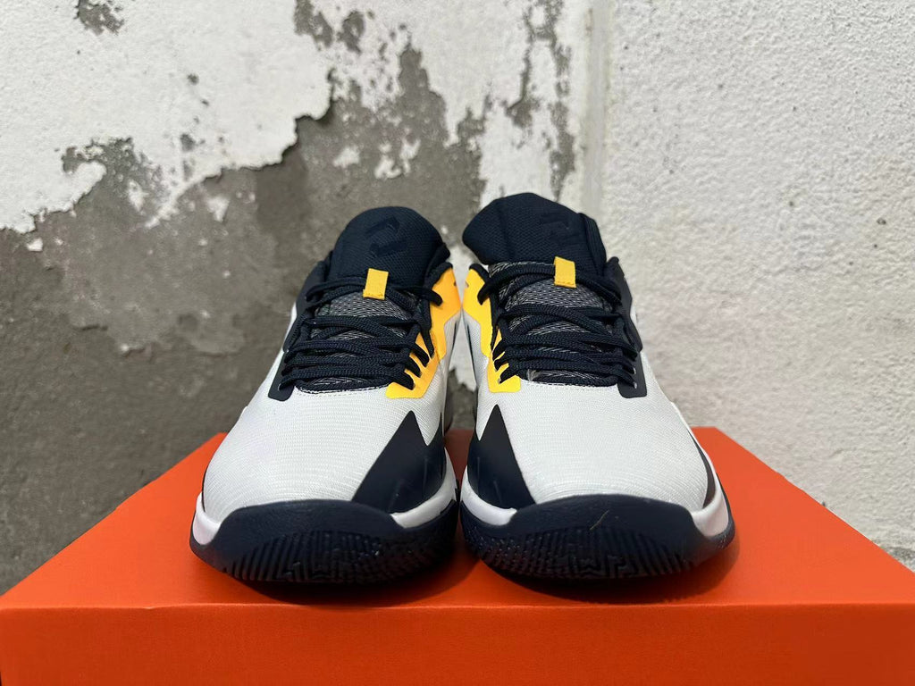 Nike Basketball Shoes, White, in Navy and Yellow - product image from the listing.