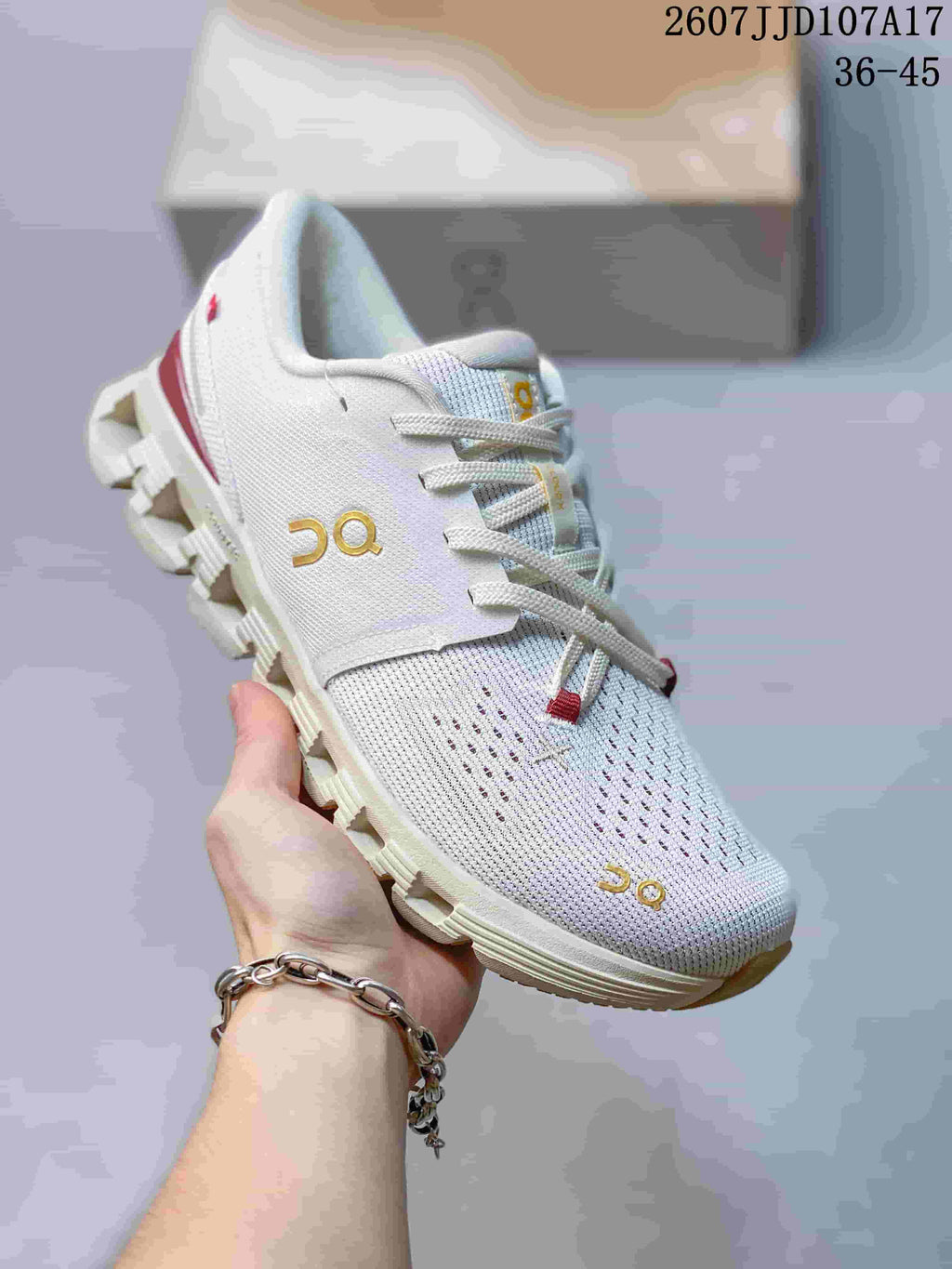 On Running Cloud X 4 AD Sneakers in White Red Gold - product image from the listing.