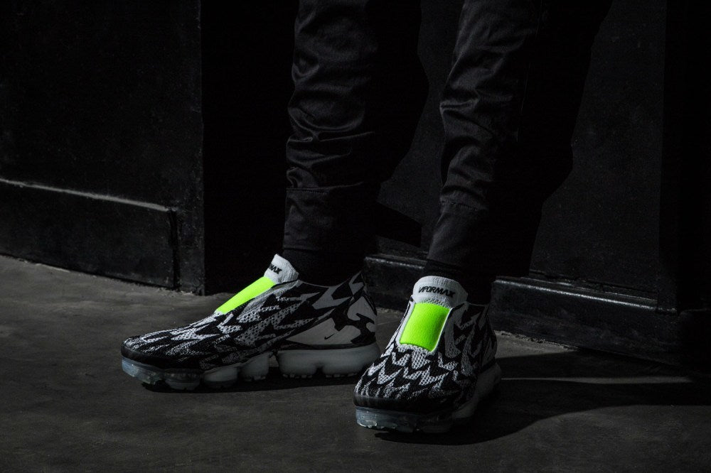 Nike Air VaporMax Moc 2 Acronym in Black White Volt AQ0996-001 - product image from the listing.