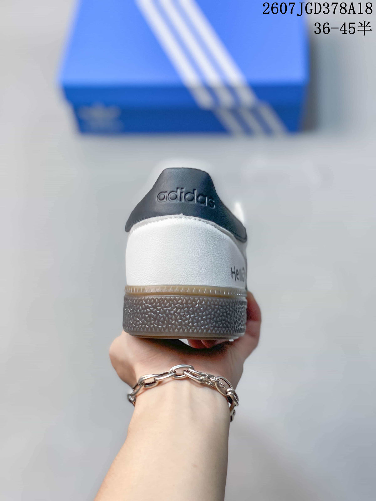 Adidas Originals JH5469 Custom Low-Top Sneakers in White Black - product image from the listing.