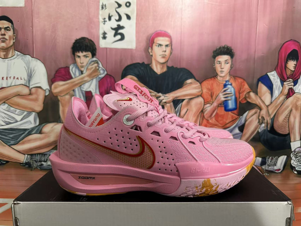 Pink and Gold Nike Basketball Shoes - product image from the listing.