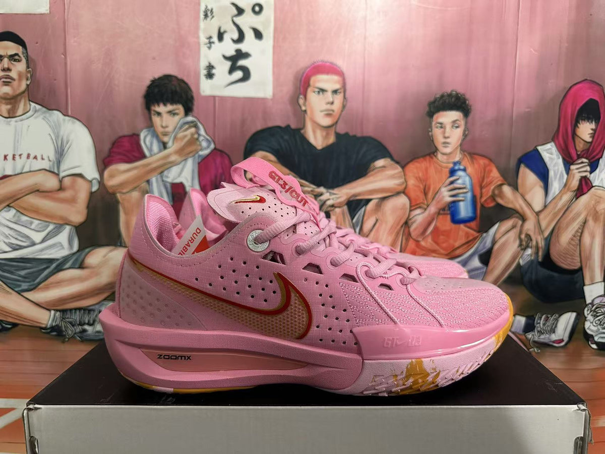 Pink and Gold Nike Basketball Shoes - product image from the listing.