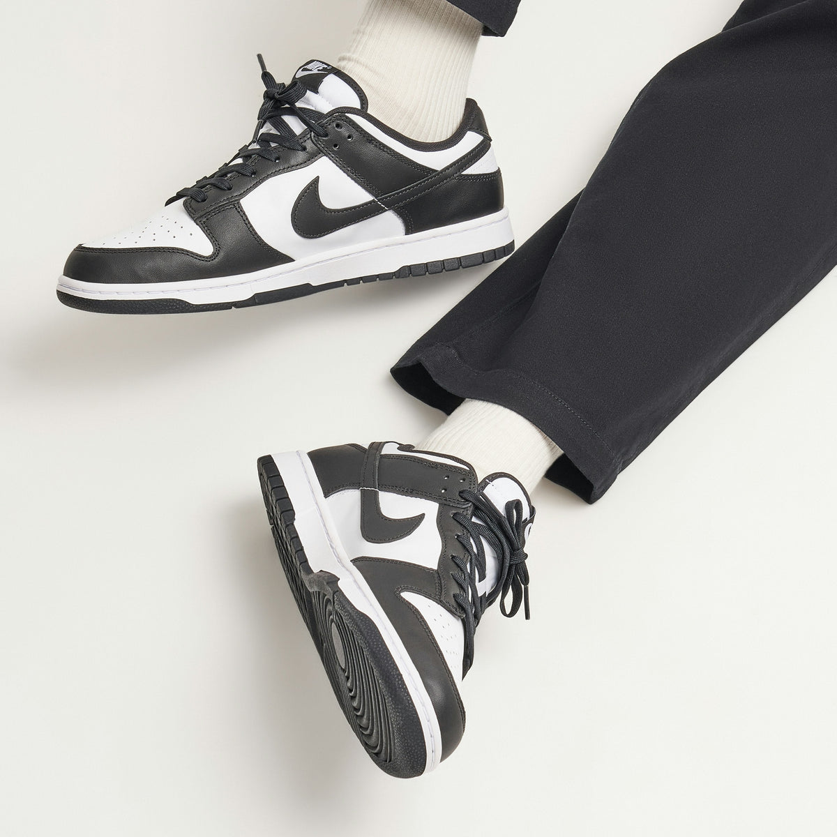 NIKE DUNK LOW RETRO in BLACK WHITE - product image from the listing.