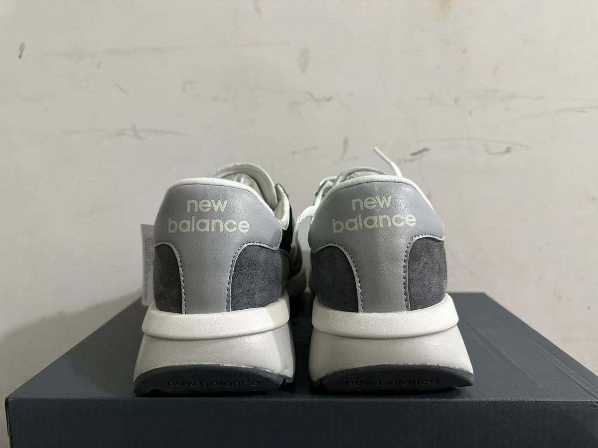 New Balance U370 Sneakers in Black, in Gray and White - product image from the listing.