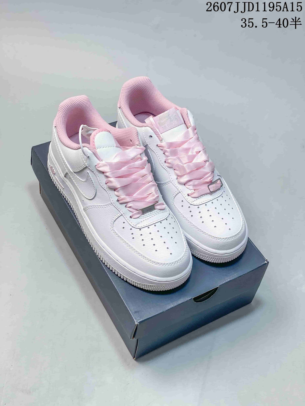 Nike Air Force 1 '07 Low Sneakers in White Pink HV4403 - product image from the listing.