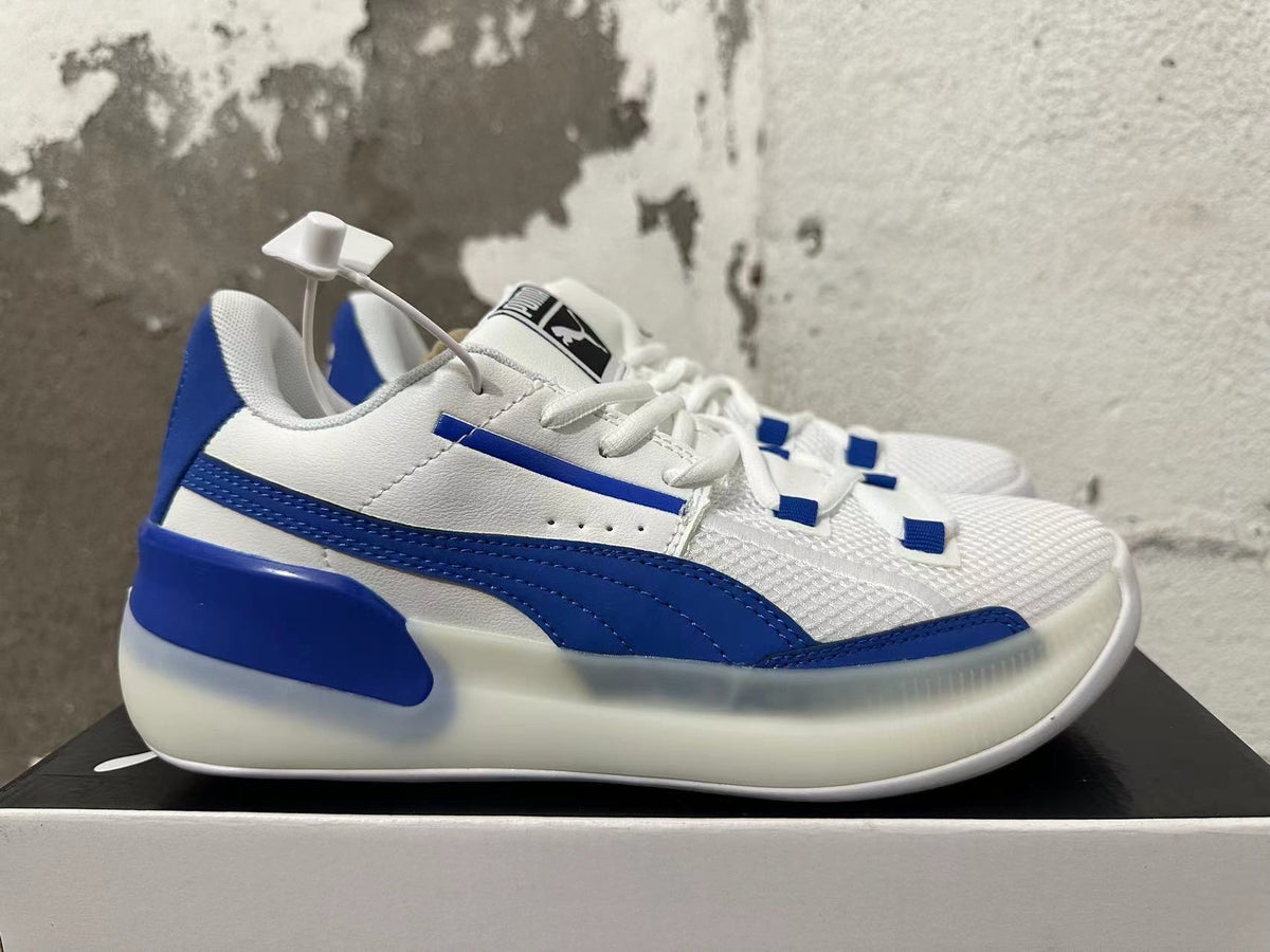 Puma Clyde Sneakers in White and Blue - product image from the listing.