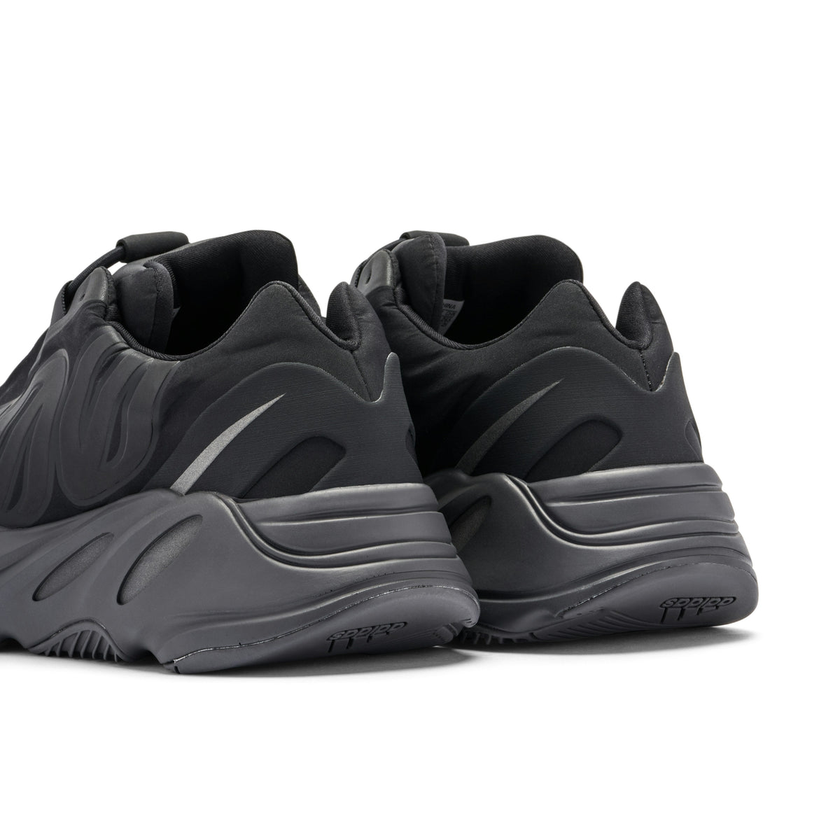 YEEZY 700 MNVN TRIPLE in BLACK - product image from the listing.