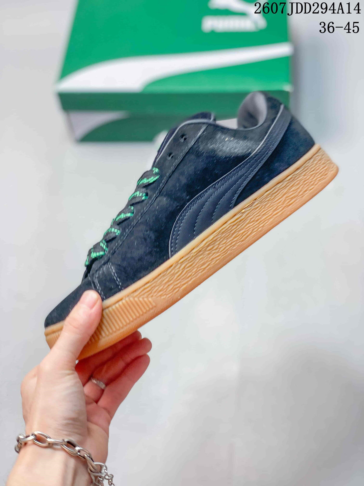 PUMA Suede XL Low-Top Sneakers in Black and Gum - product image from the listing.