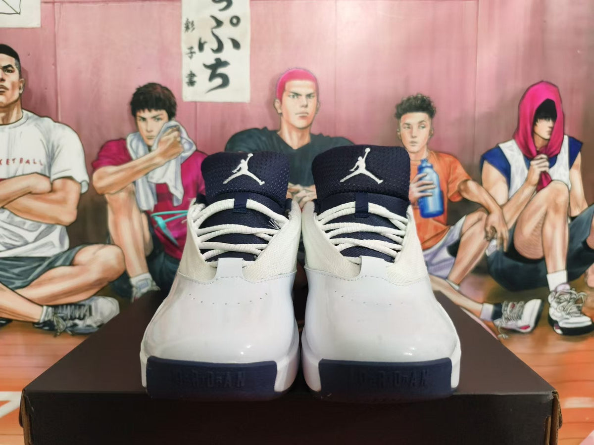 Jordan White Basketball Footwear with Navy and Red Accents - product image from the listing.