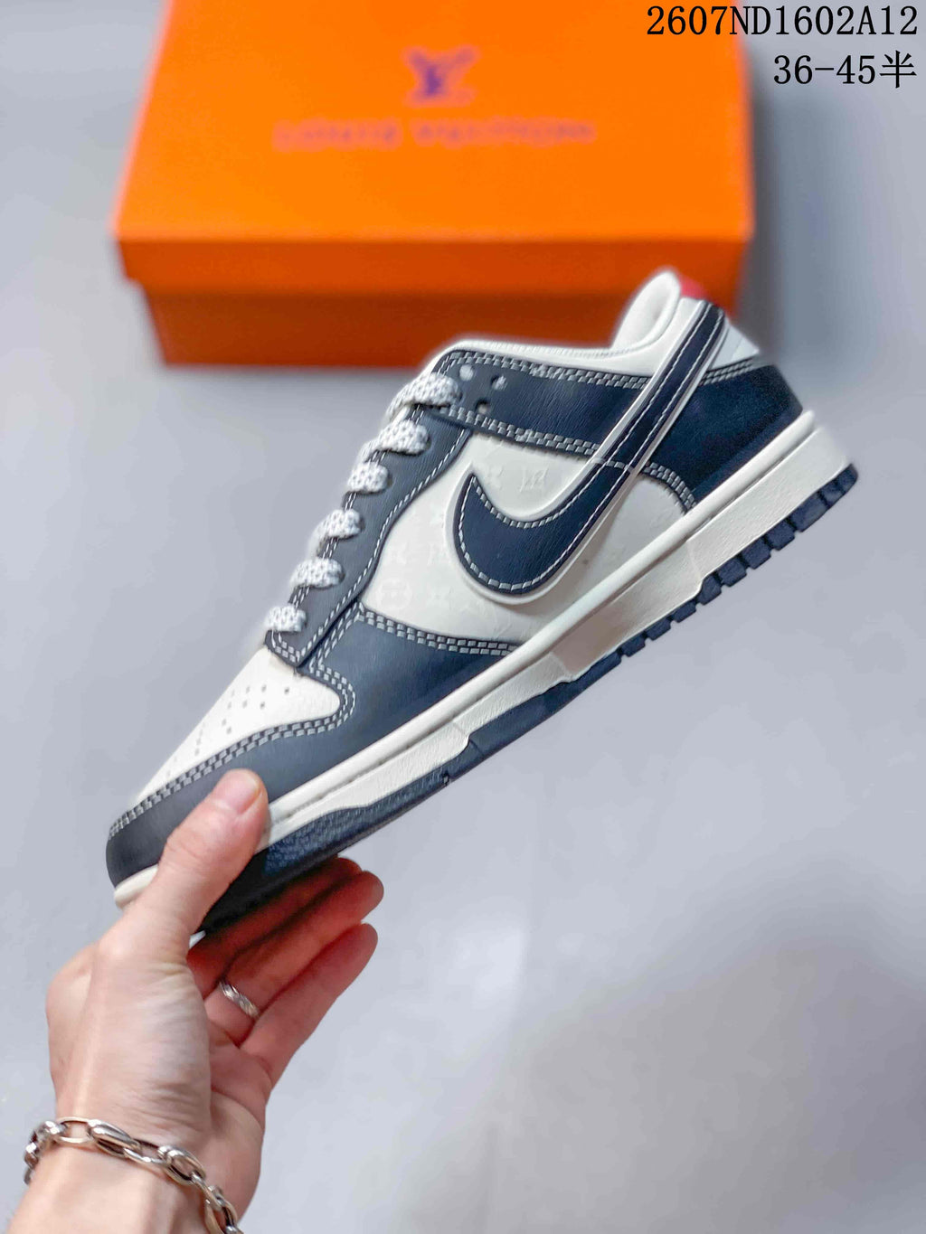 Nike SB Dunk Low Sneakers in Black White Red - product image from the listing.