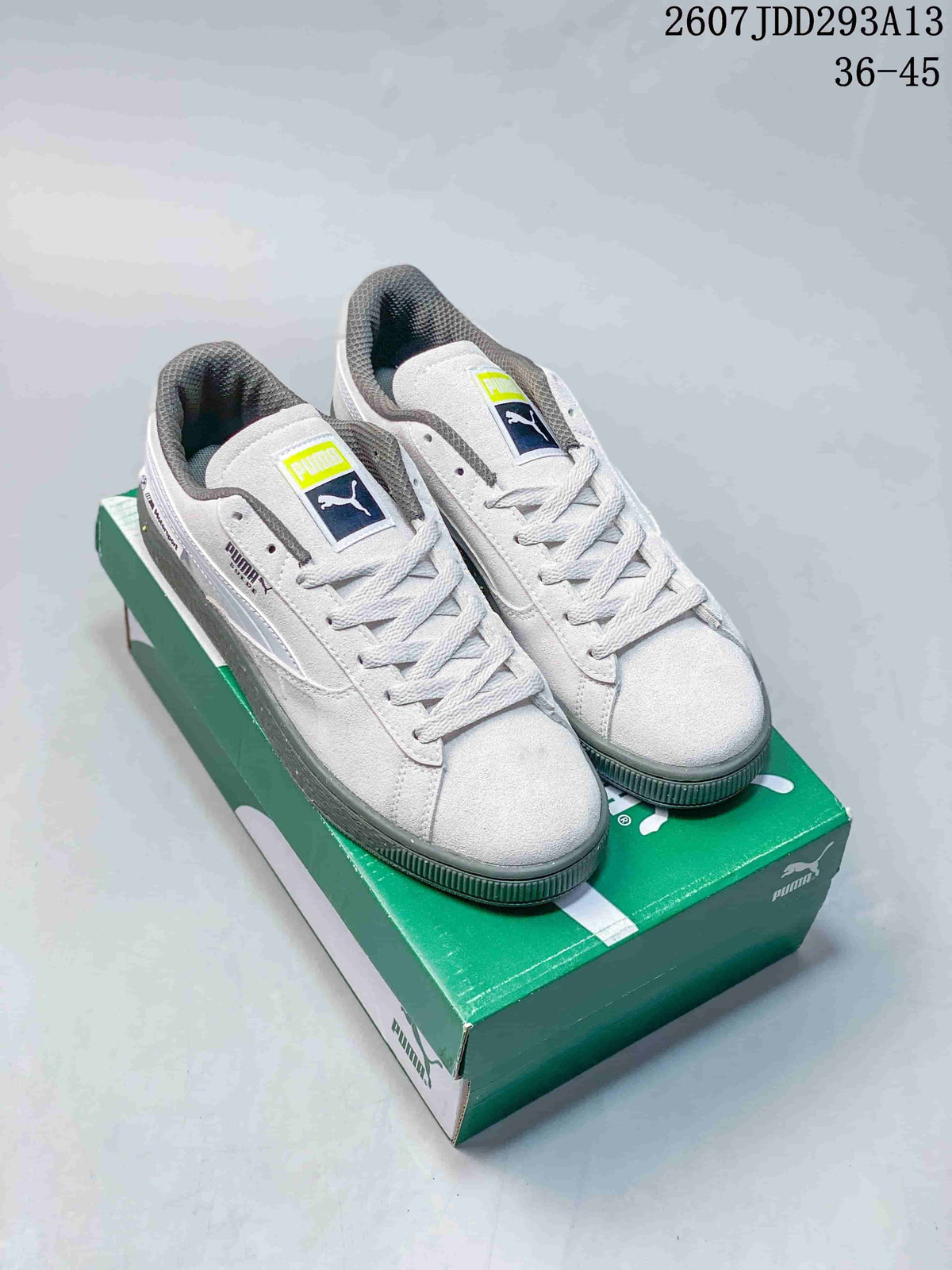 PUMA BMW MMS Suede XL Sneakers in White and Gray 2607JDD293A13 - product image from the listing.