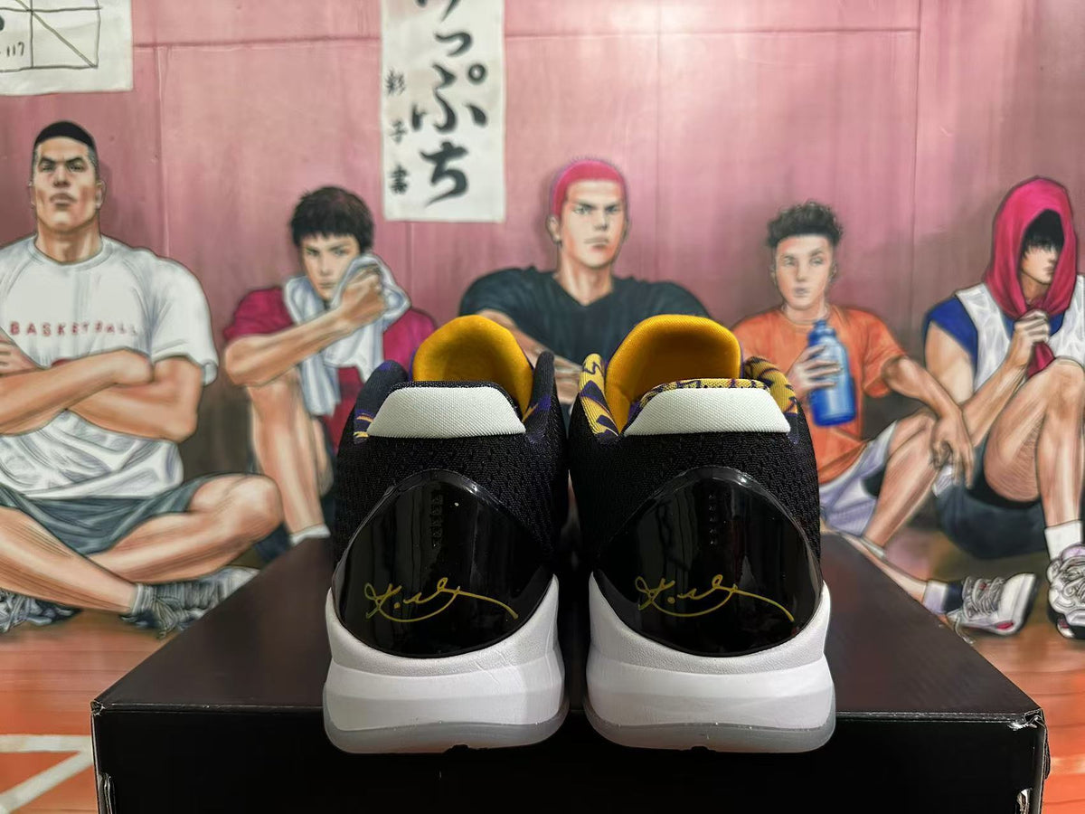 Nike Kobe Basketball Shoes in Purple Black Gold - product image from the listing.