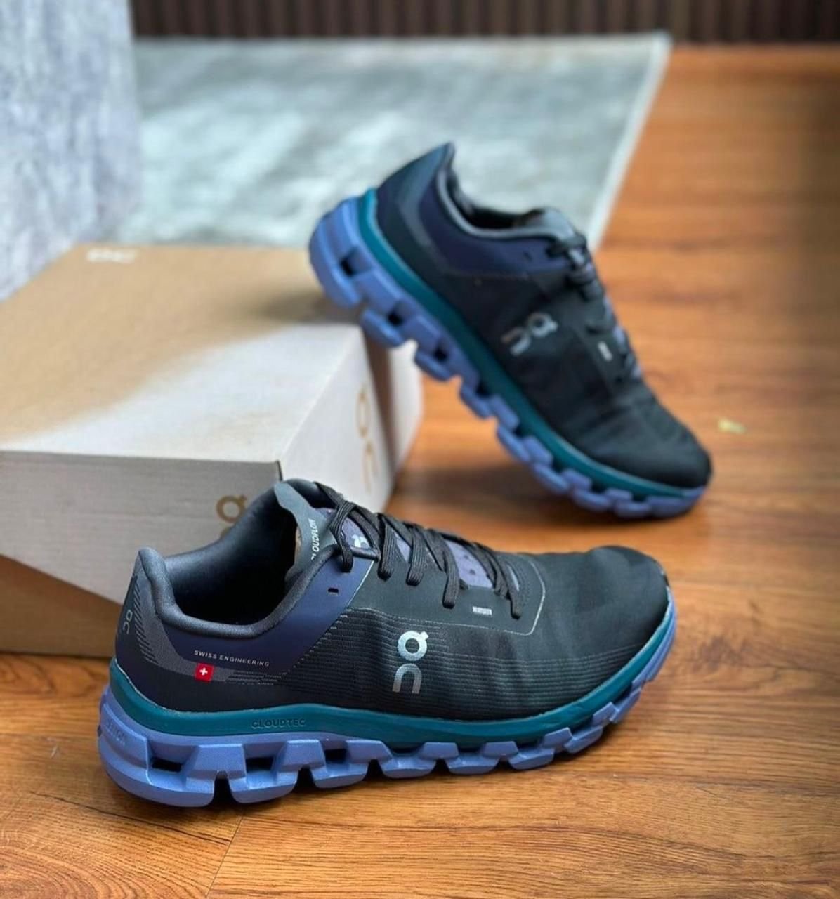 On Cloudflow 4 Black Storm Shoes for Running - product image from the listing.