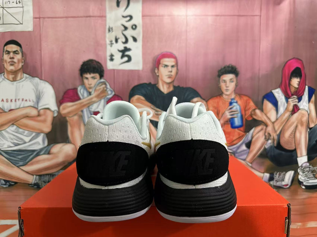 Nike Basketball Shoes in White Black Gold - product image from the listing.