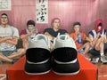 Nike Basketball Shoes in White Black Gold - product image from the listing.