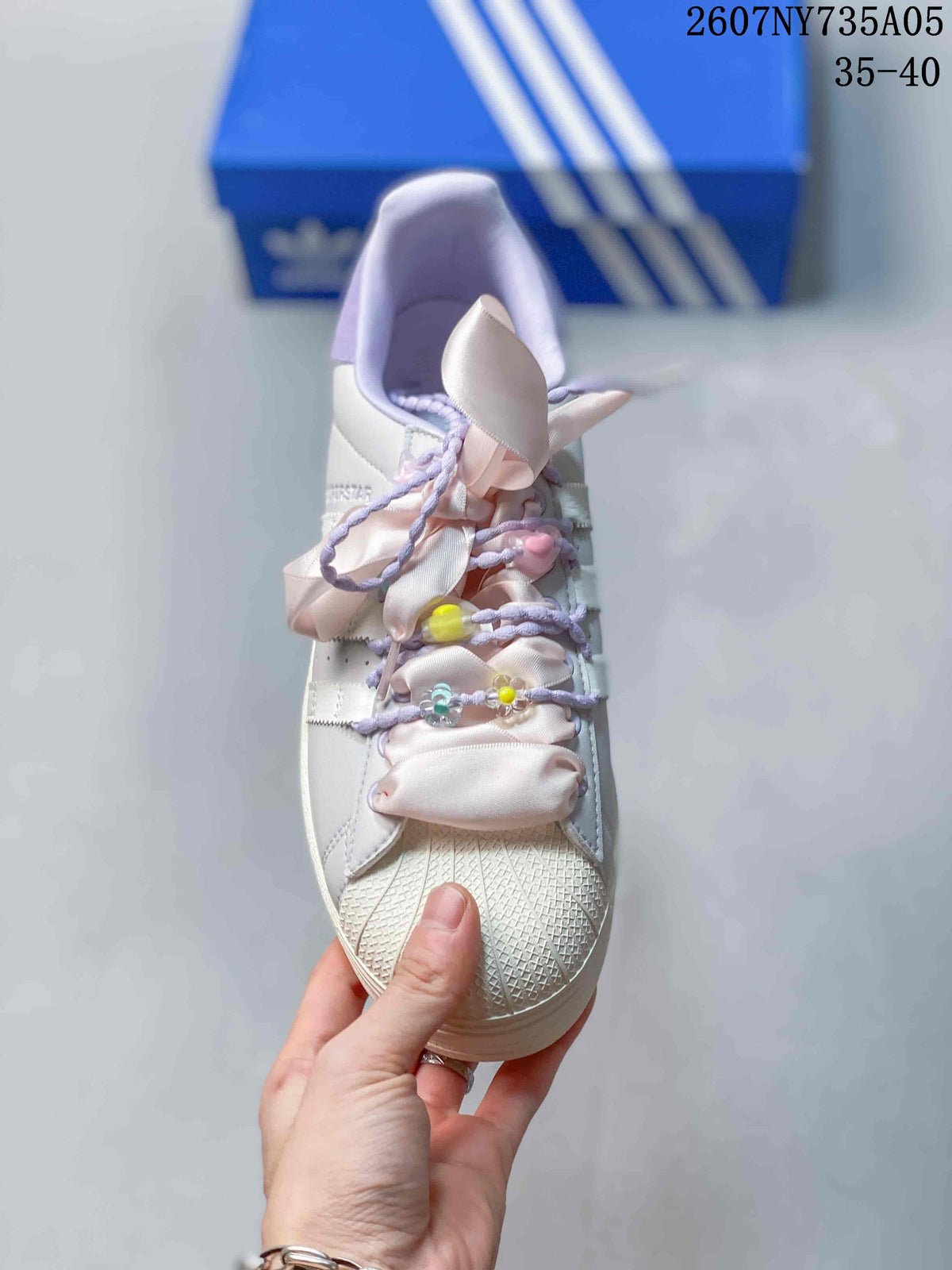 Adidas Superstar Custom White Trainers with Lilac and Pink Details - product image from the listing.