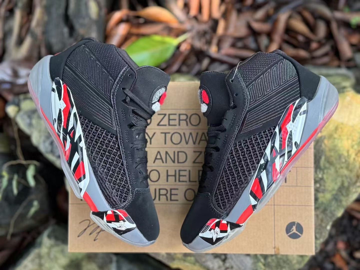 Jordan XXXVIII Playoffs 23 Basketball Shoes in Black Red - product image from the listing.