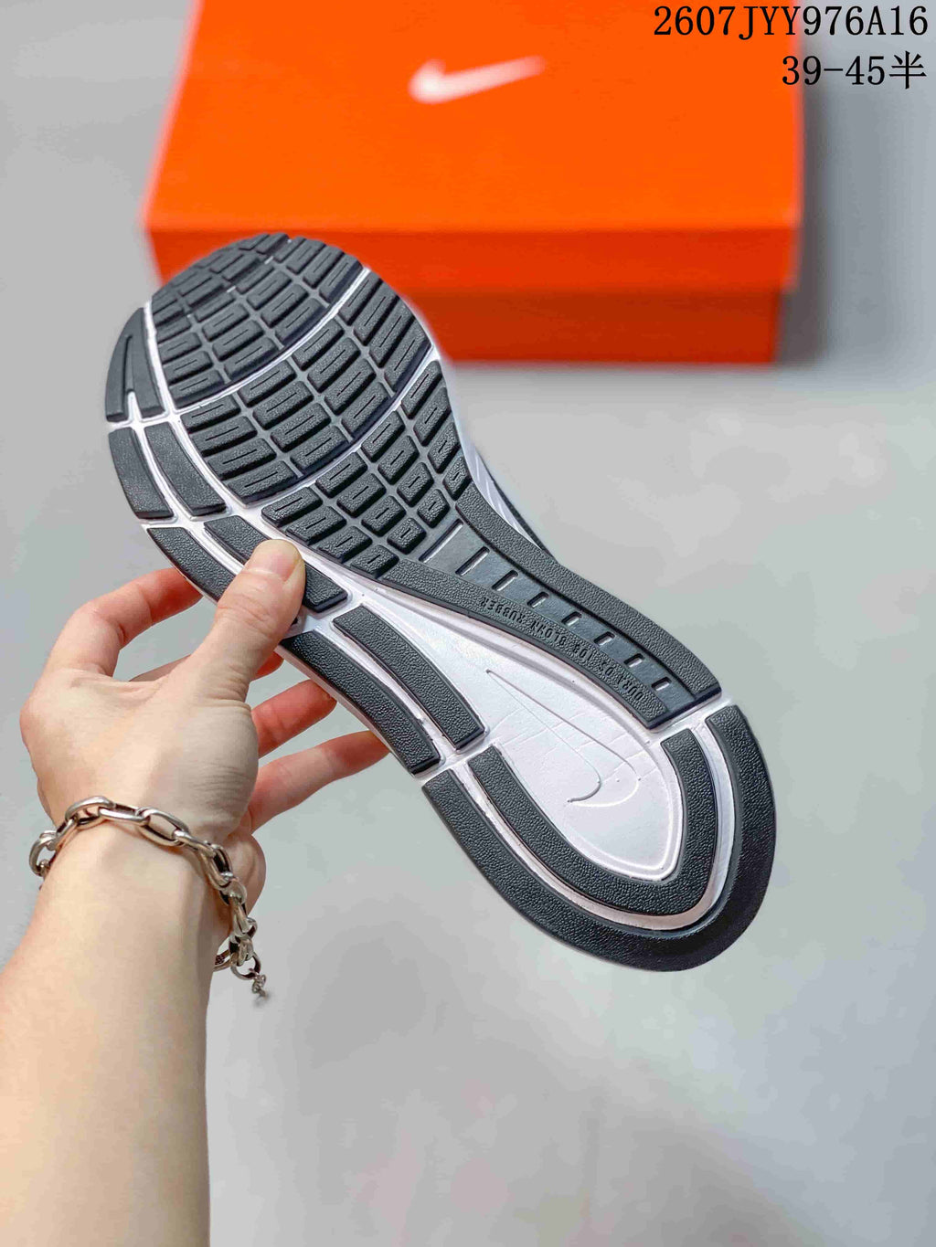 Nike Zoom Structure 23 Running Sneakers in Black White - product image from the listing.