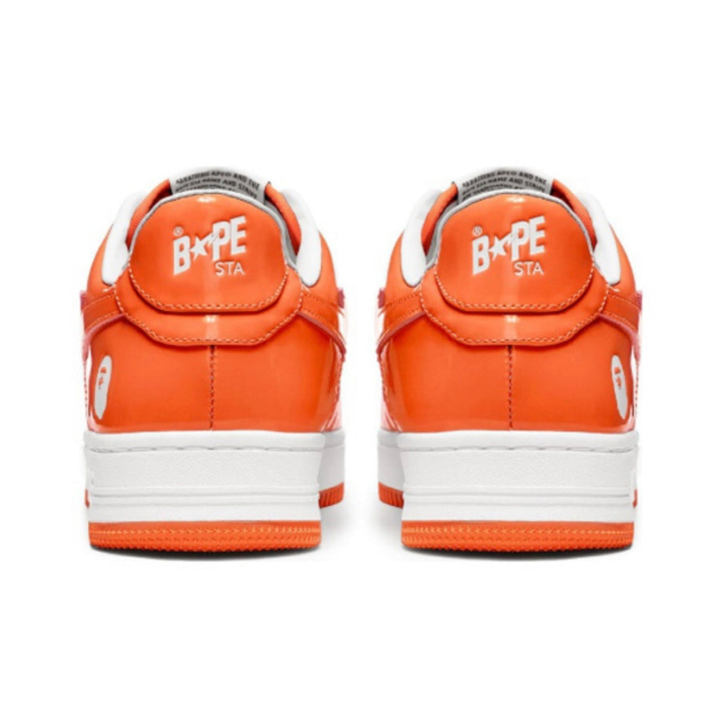 A Bathing Ape BAPE STA Low Sneakers in White Orange - product image from the listing.