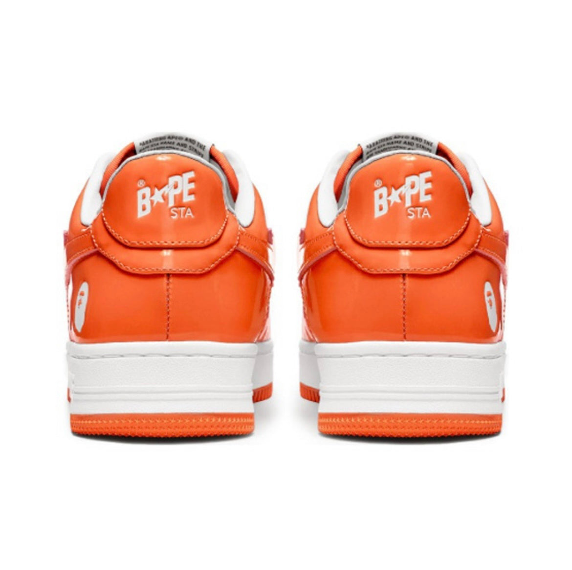 A Bathing Ape BAPE STA Low Sneakers in White Orange - product image from the listing.