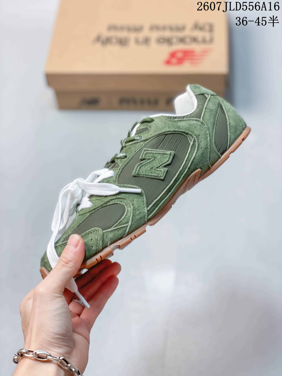 Miu Miu x New Balance 530 SL Sneakers in Green 2607JLD556A16 - product image from the listing.