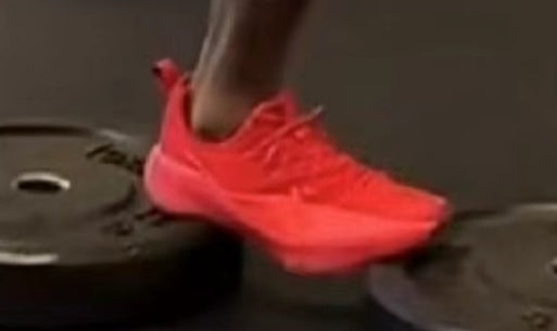 Red Lightweight Sneakers for Running - product image from the listing.